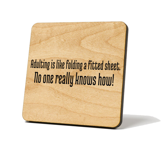 Adulting Is Like Folding A Fitted Sheet Quote Coaster