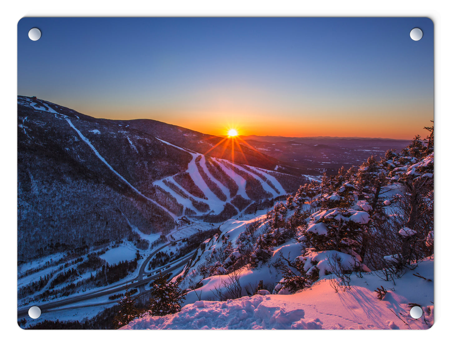 Last Winter Sunset over Cannon Mountain Glass Panel by Chris Whiton