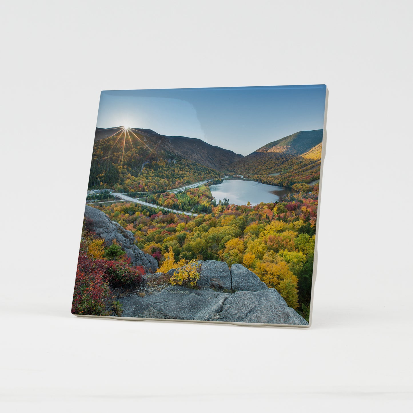Artist Bluff Autumn Sunburst Ceramic Coaster by Chris Whiton