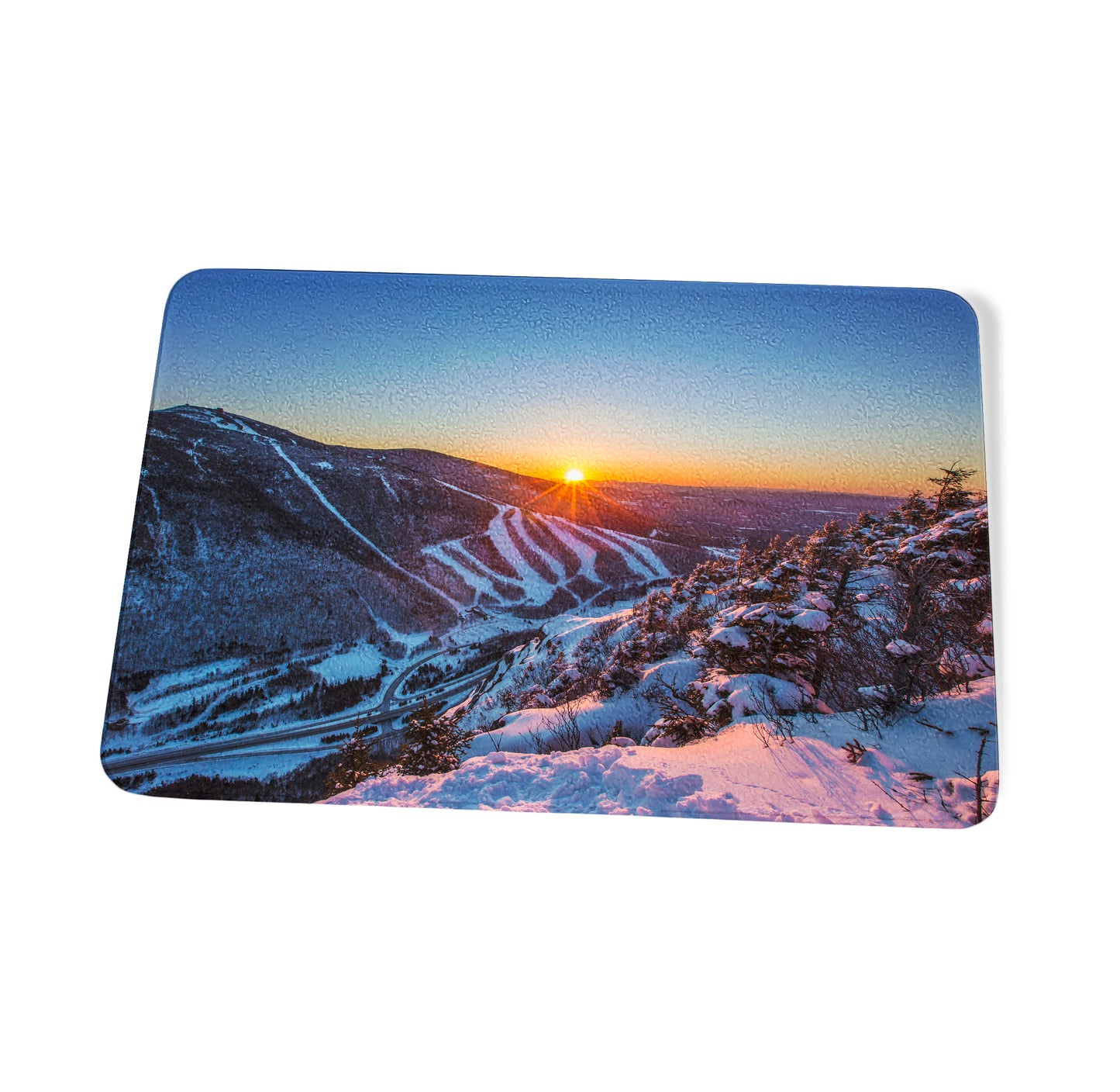 Last Winter Sunset over Cannon Mountain Cutting Board by Chris Whiton