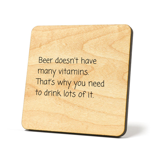 Beer doesn't have many vitamins Quote Coaster