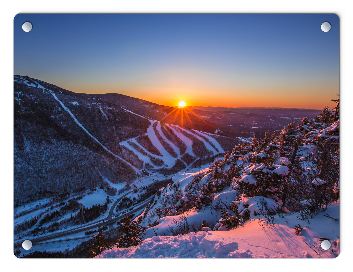 Last Winter Sunset over Cannon Mountain Glass Panel by Chris Whiton