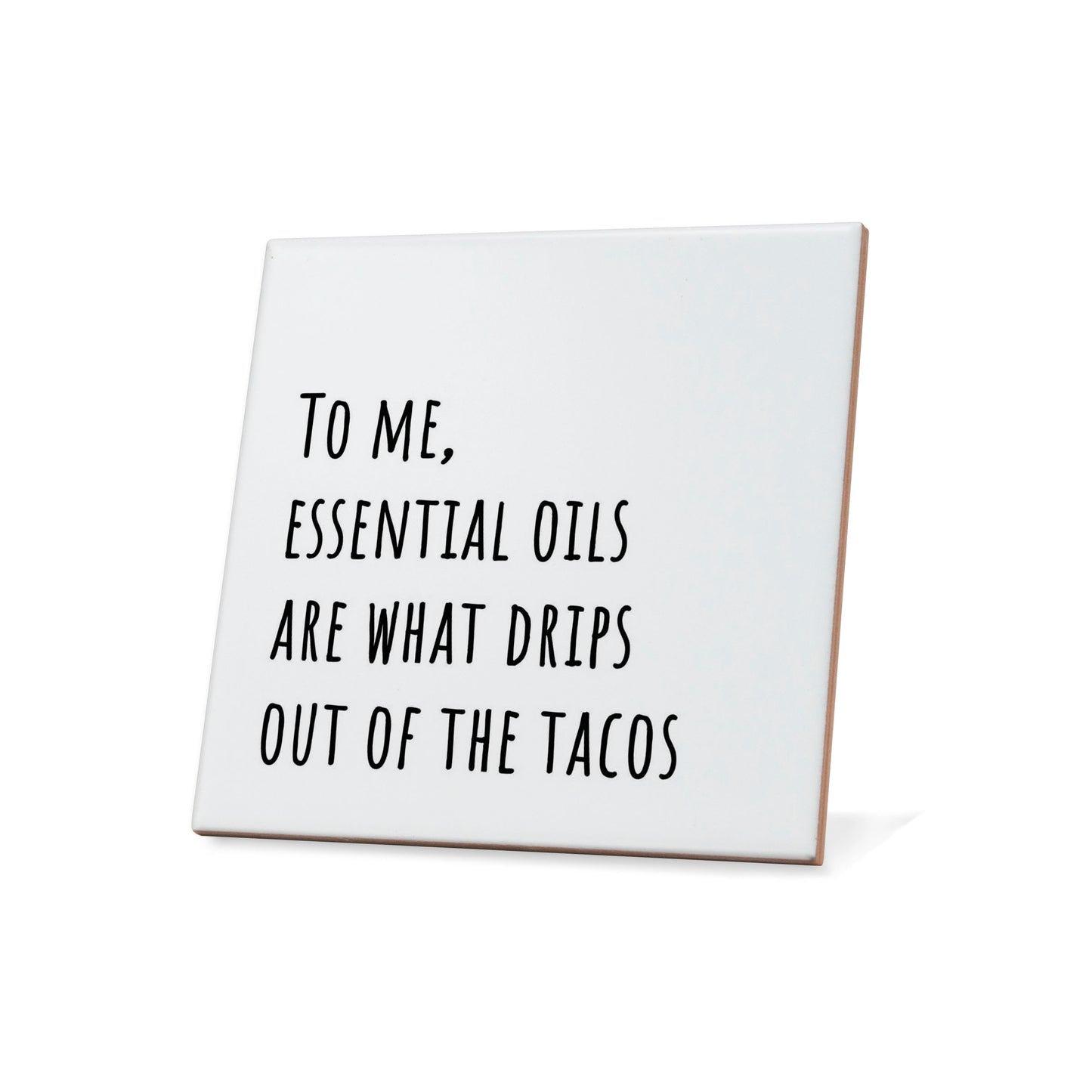 To me, essential oils are what drips out of the tacos Quote Coaster